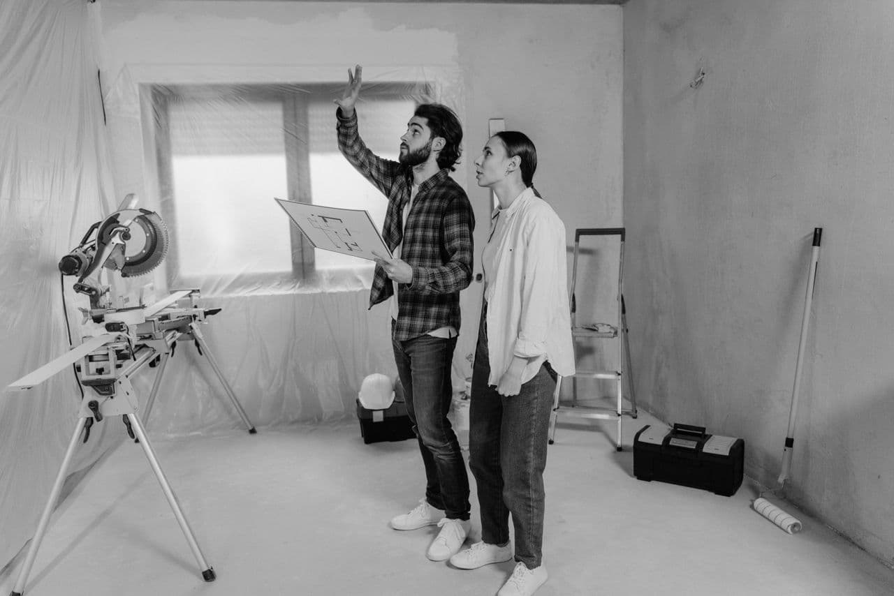 Renovation tools and blueprints for a home project
